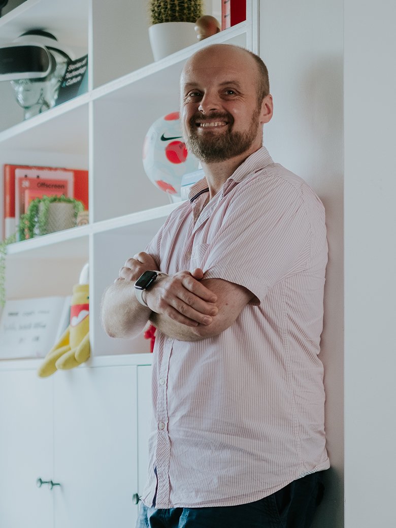 Steven Wake sitting in an office environment