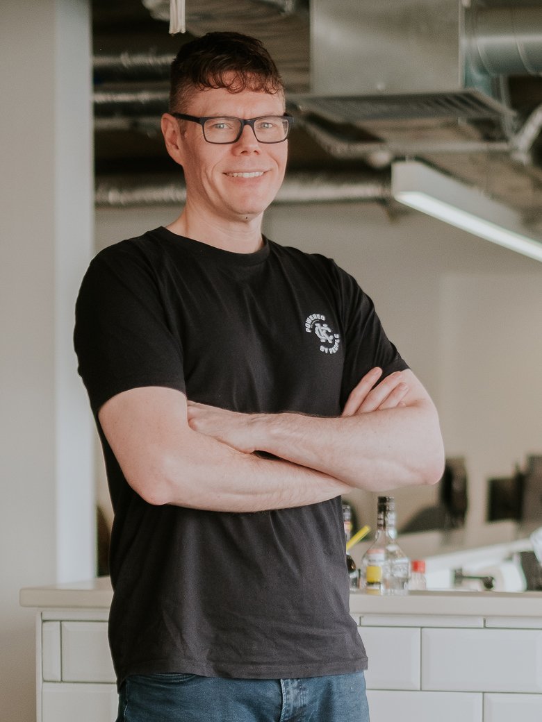 Andy Pike sitting in an office environment