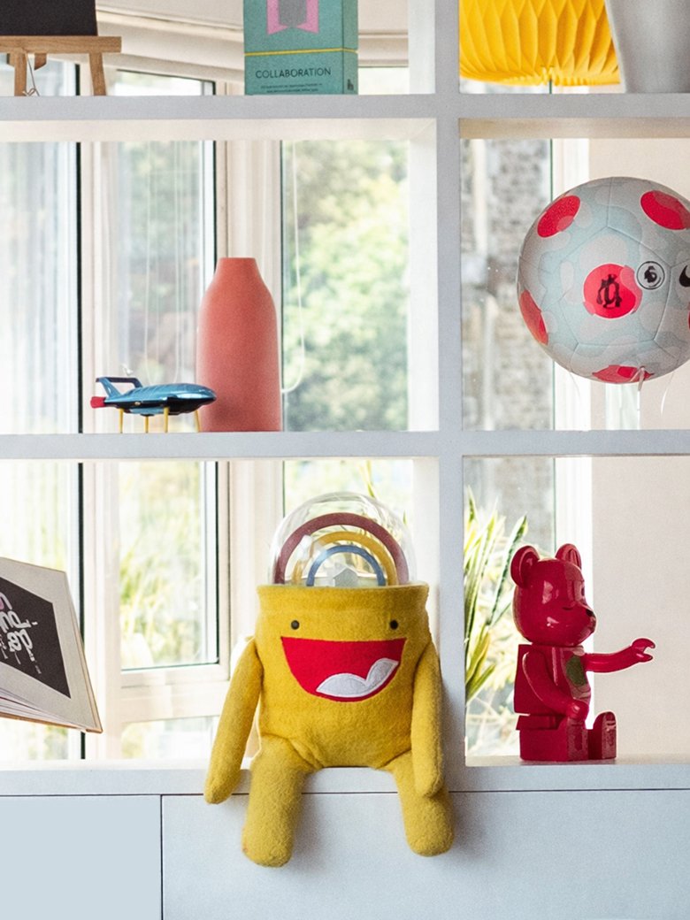 Big Rainbow Head sitting in an office environment