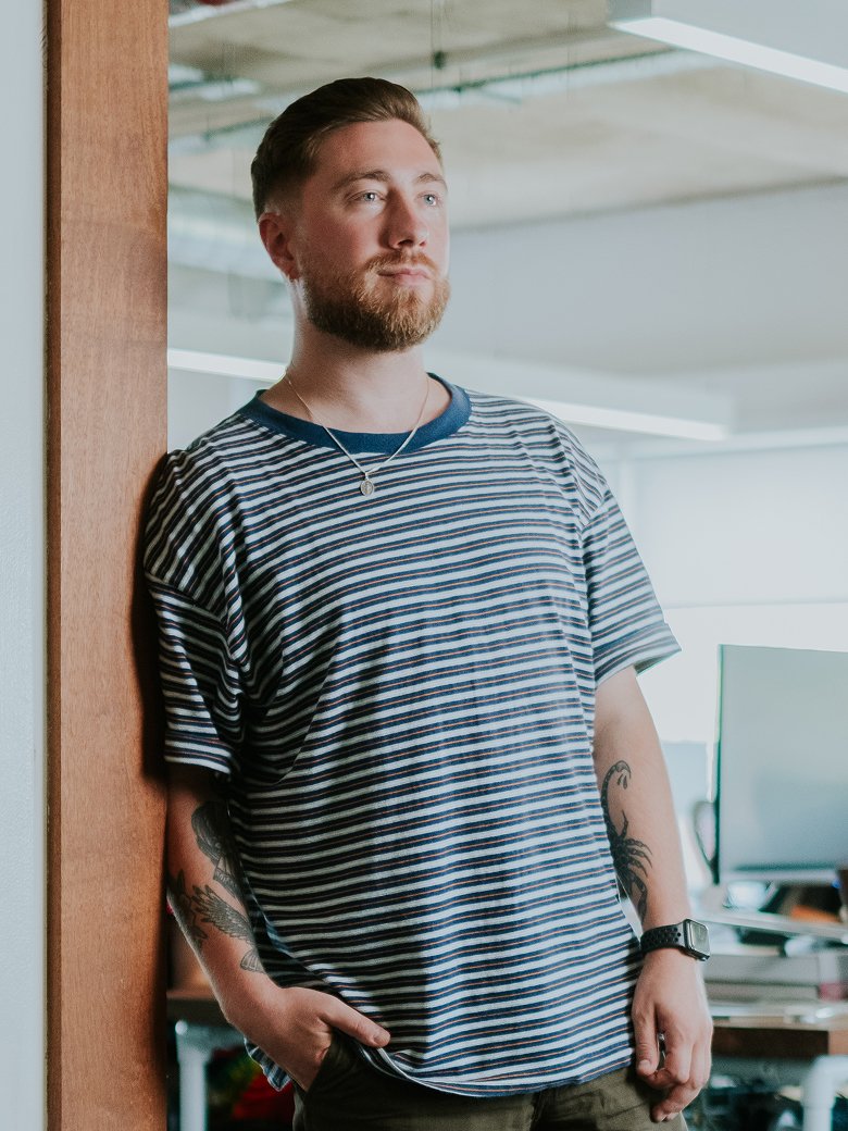 Jamie Hunter sitting in an office environment